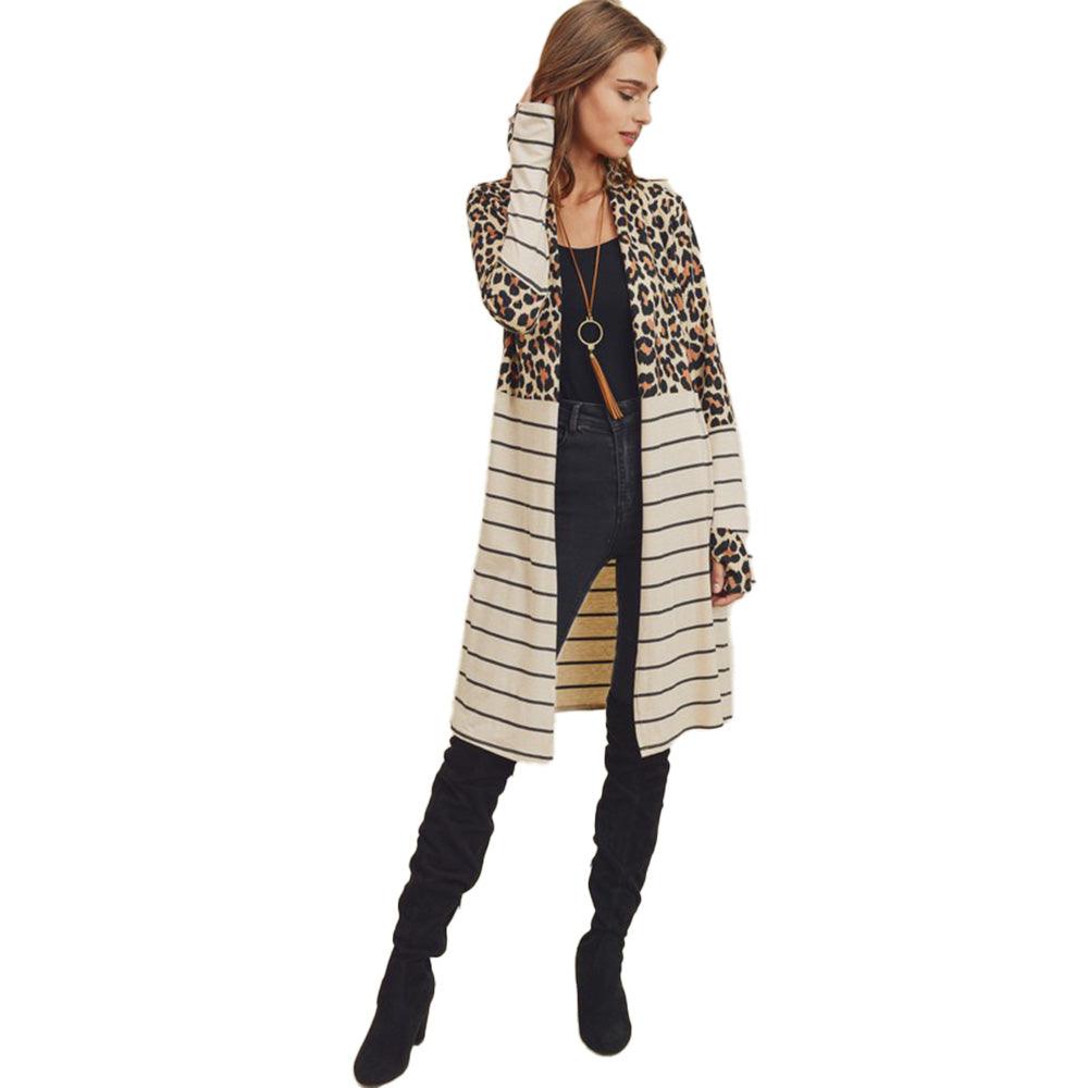 a woman wearing a leopard print cardigan