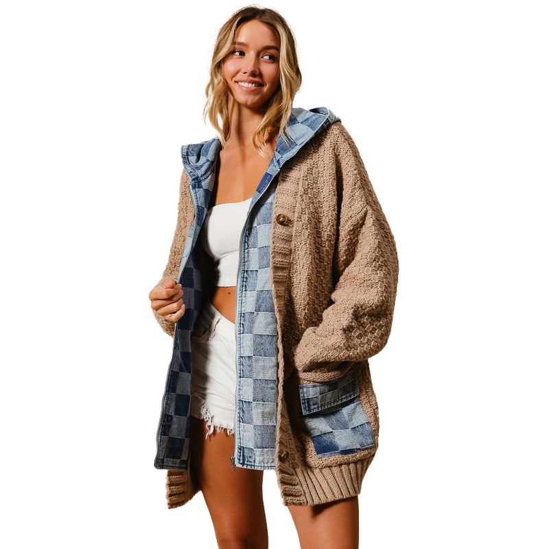 a woman wearing a jacket and shorts