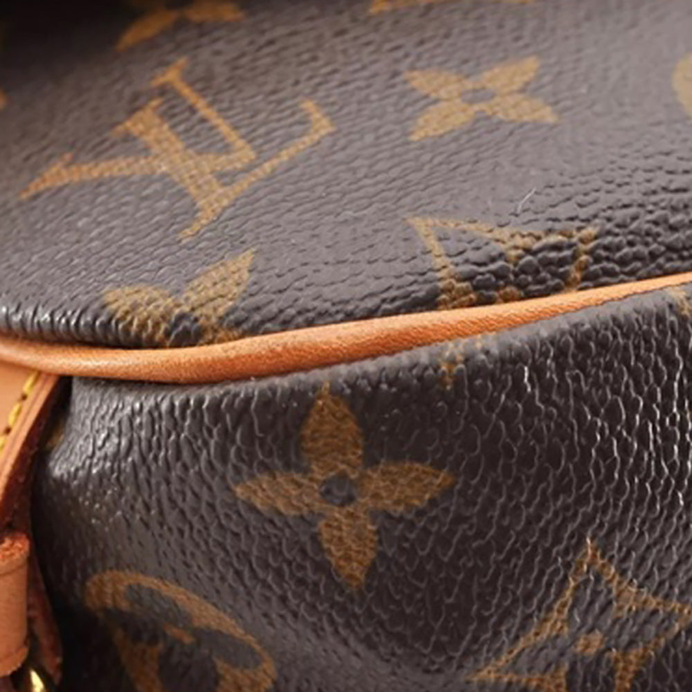 a close up of a brown and tan bag