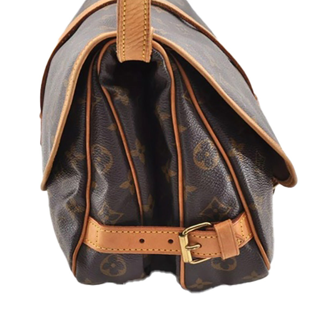 a louis vuitton bag with a brown strap