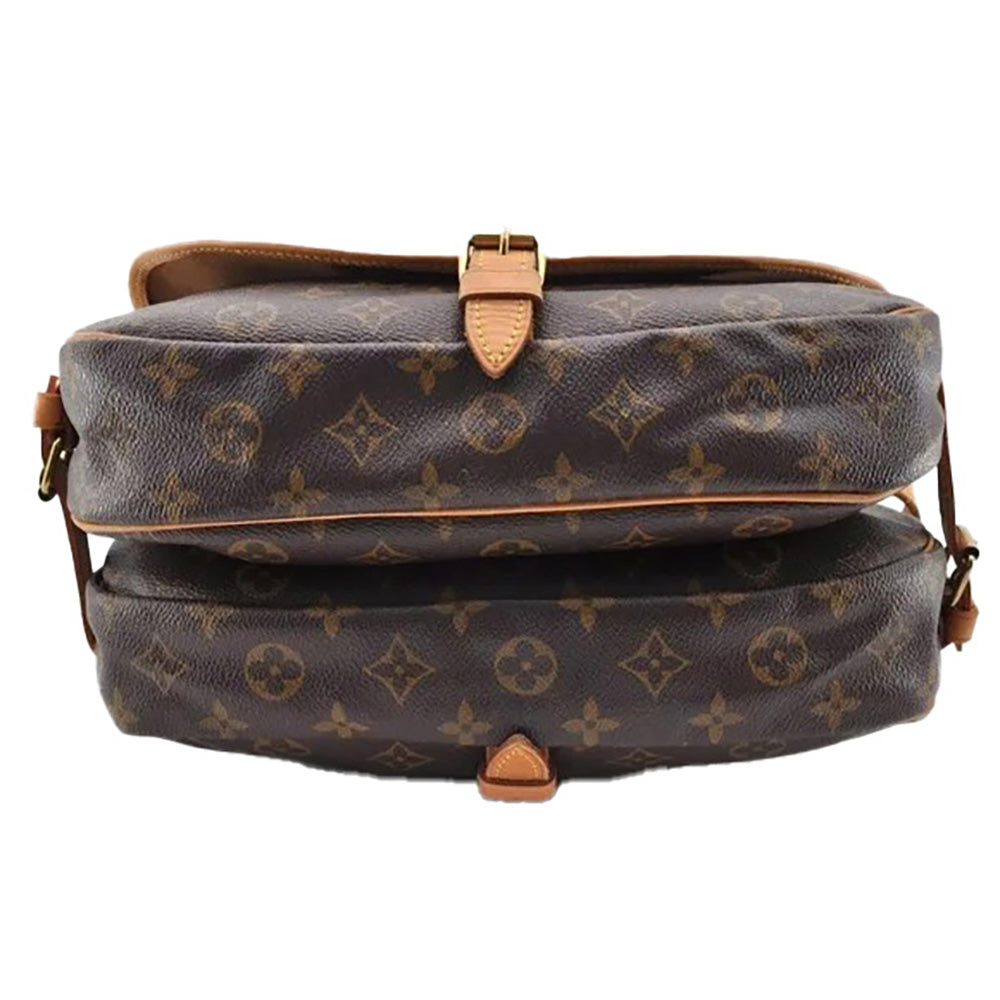 a brown louis vuitton bag on a white background