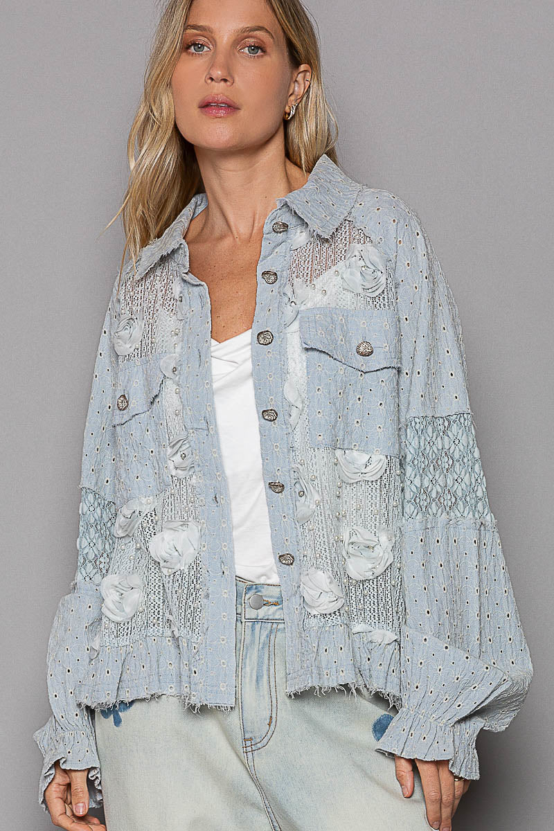 a woman wearing a denim jacket and jeans