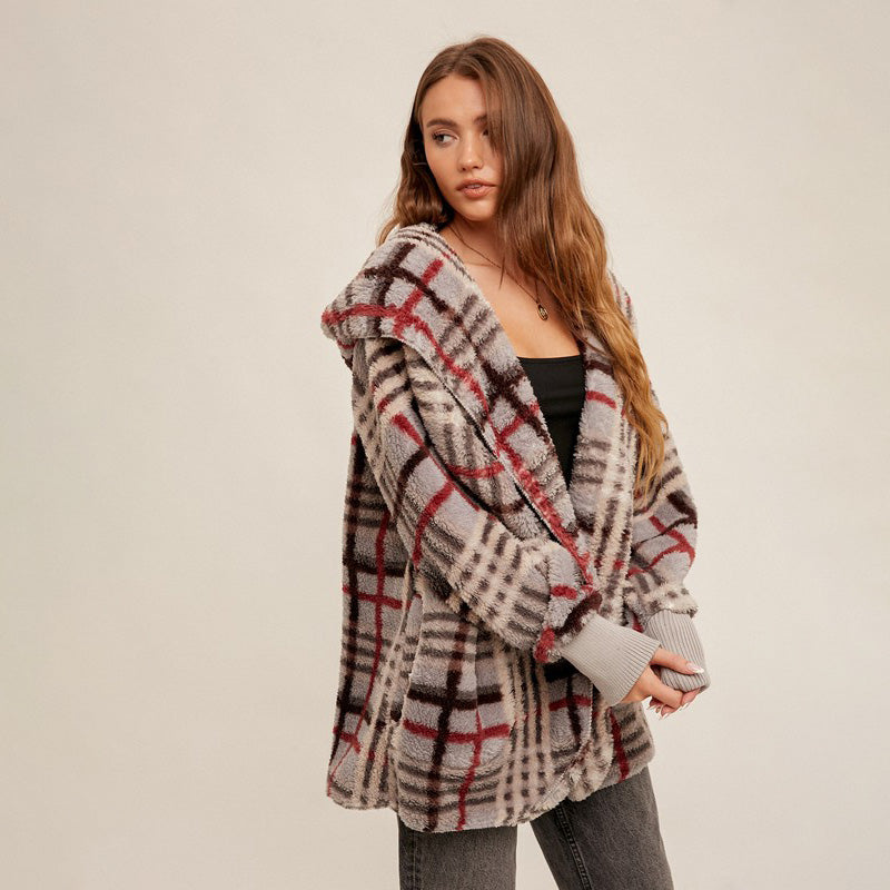 The model is wear this stylish and cozy women's hoodie jacket is perfect for when the weather turns chill, grey mix color, side front.