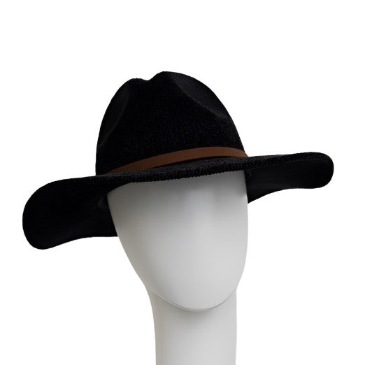 a white mannequin head wearing a black hat