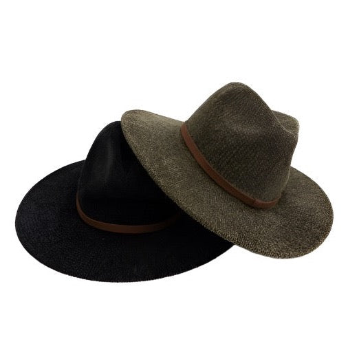 two hats sitting side by side on a white background