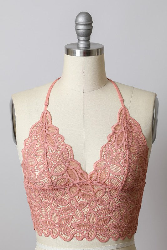 a dress on a mannequin with pink lace