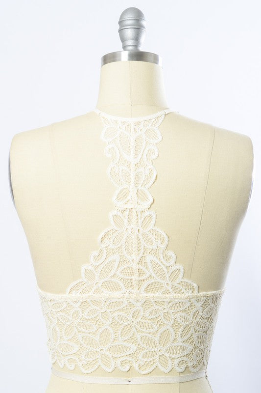 a dress on a mannequin with white lace