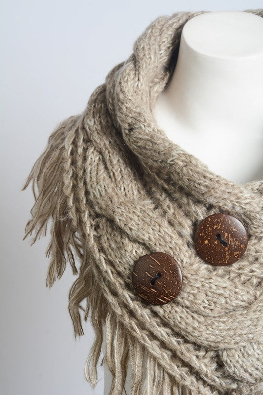 a white mannequin wearing a scarf with buttons