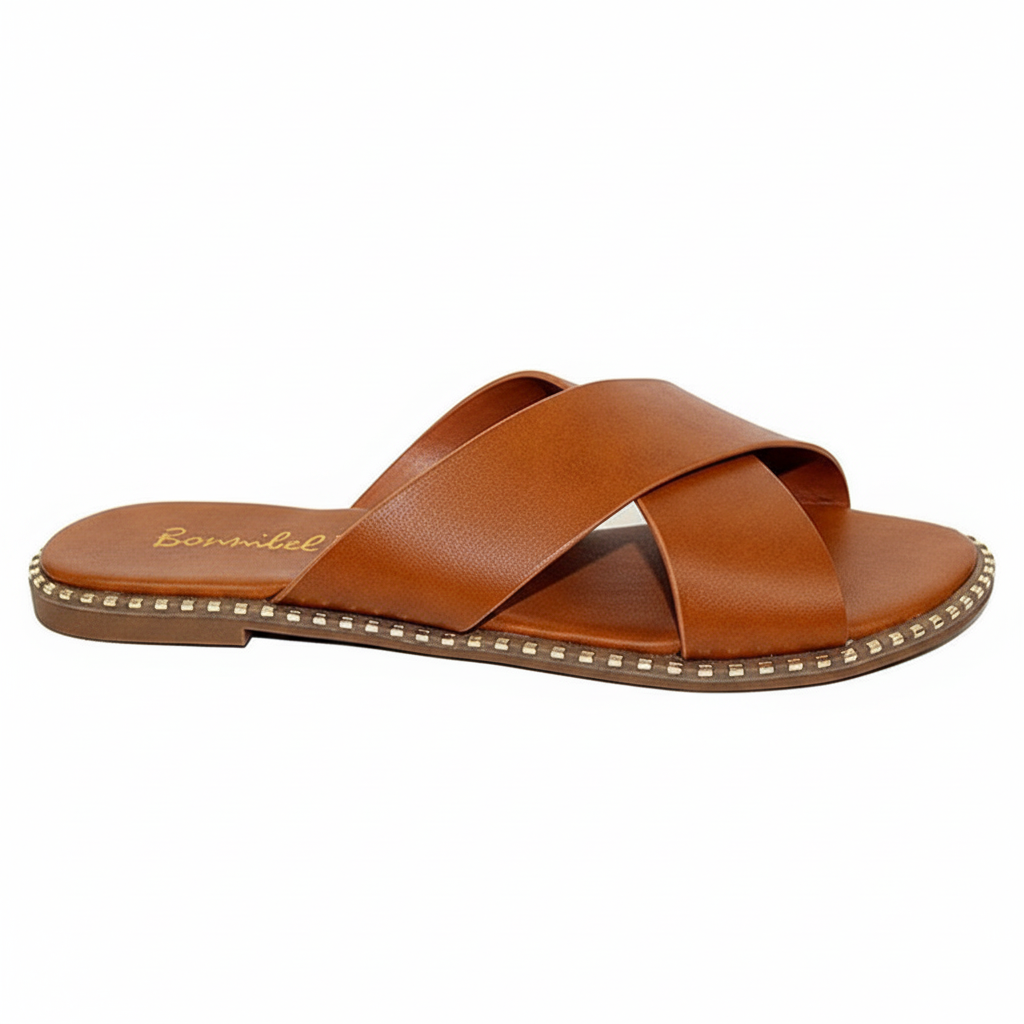 Tan slide sandals with crisscross straps - side profile