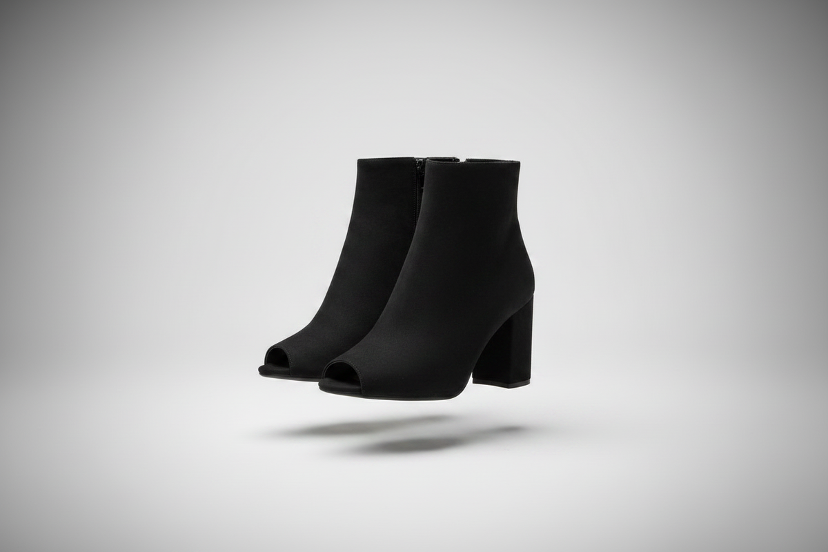 Black peep-toe block heel ankle booties pair angled product shot for BellanBlue Sale Shoes collection