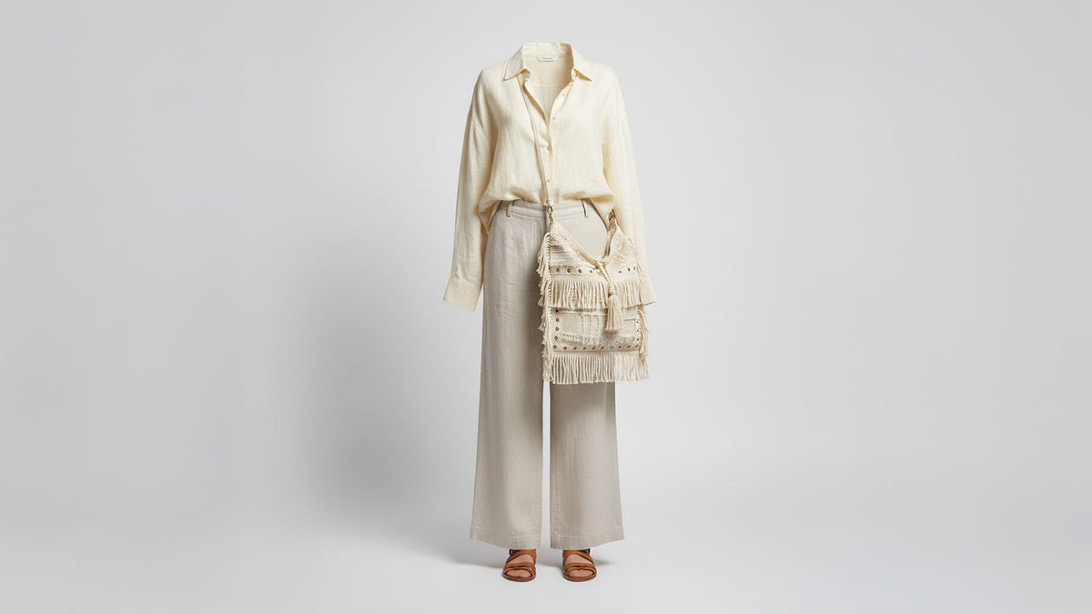 POL Clothing Bags — women's boho artisan bag collection with cream patchwork fringe hobo bag styled ghost mannequin - BellanBlue