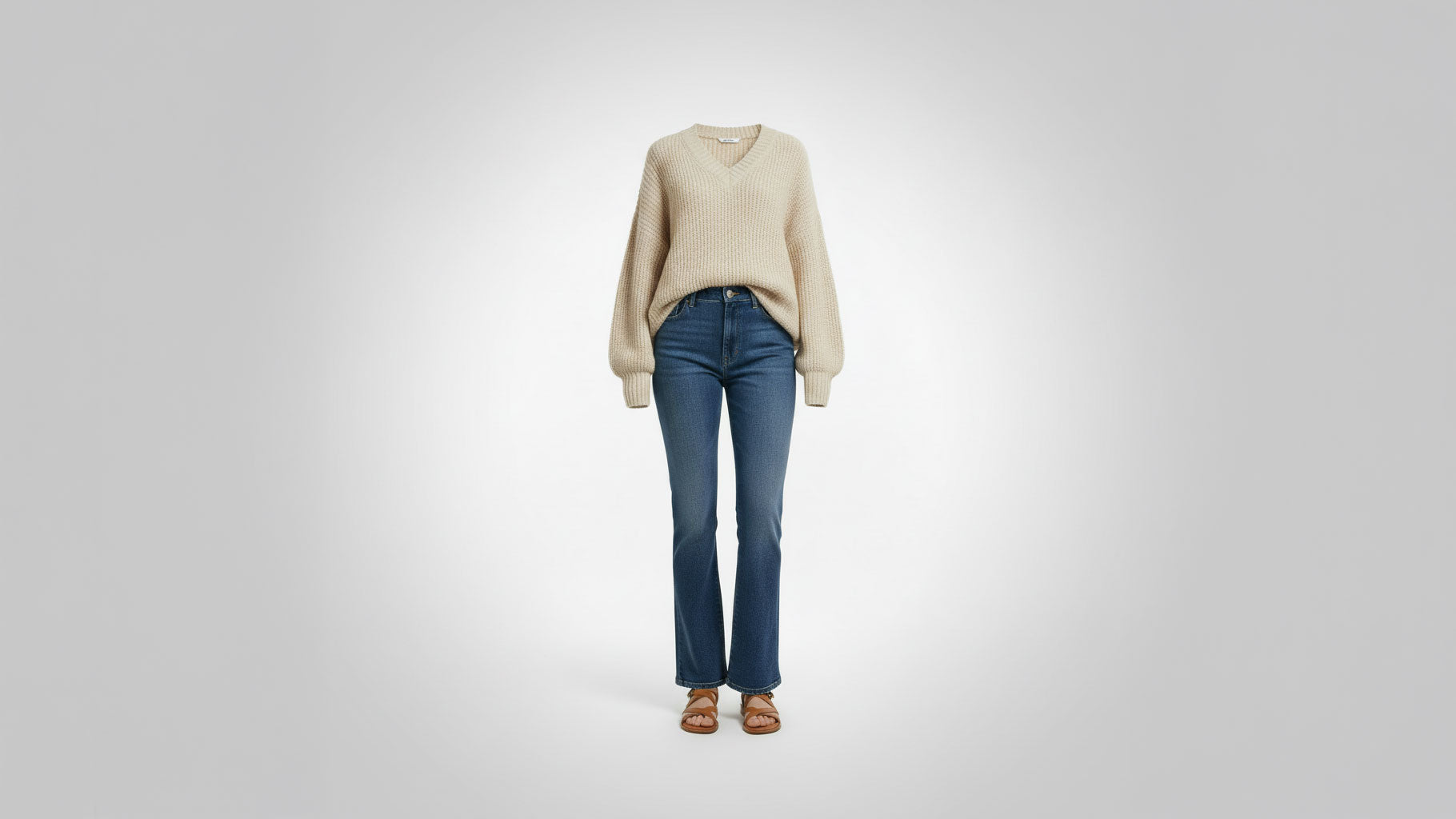 Women's sweaters collection featuring oversized knit pullovers, relaxed V-neck sweaters, chunky ribbed knits, and cozy boutique layering styles