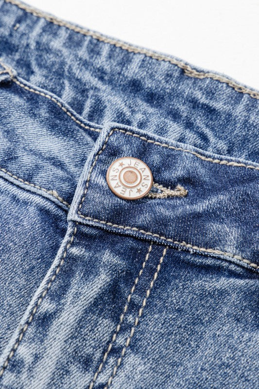 Laylani flared jeans - close up of denim button detail