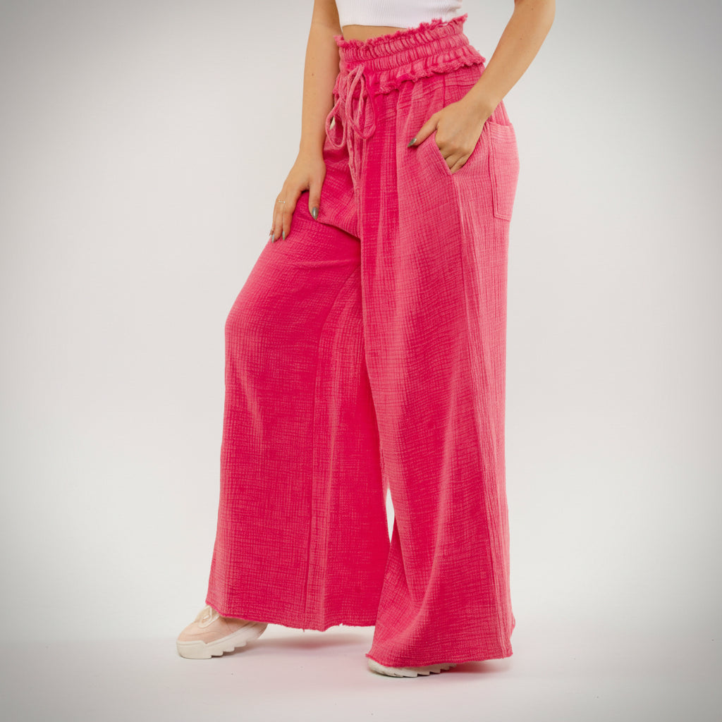 Bluevelvet mineral wash wide leg pants in hot pink with waist tie detail, front view