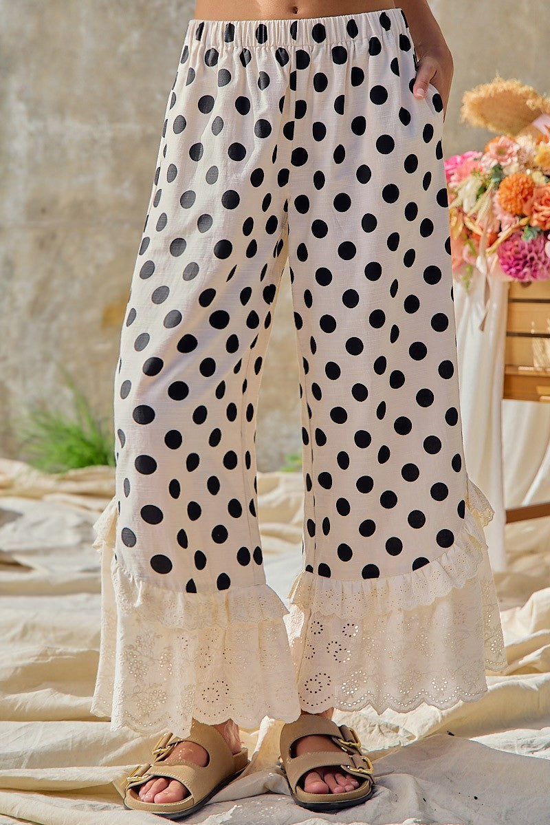 BiBi women's cream black polka dot wide leg palazzo pants with ruffle lace hem, full-length front view

