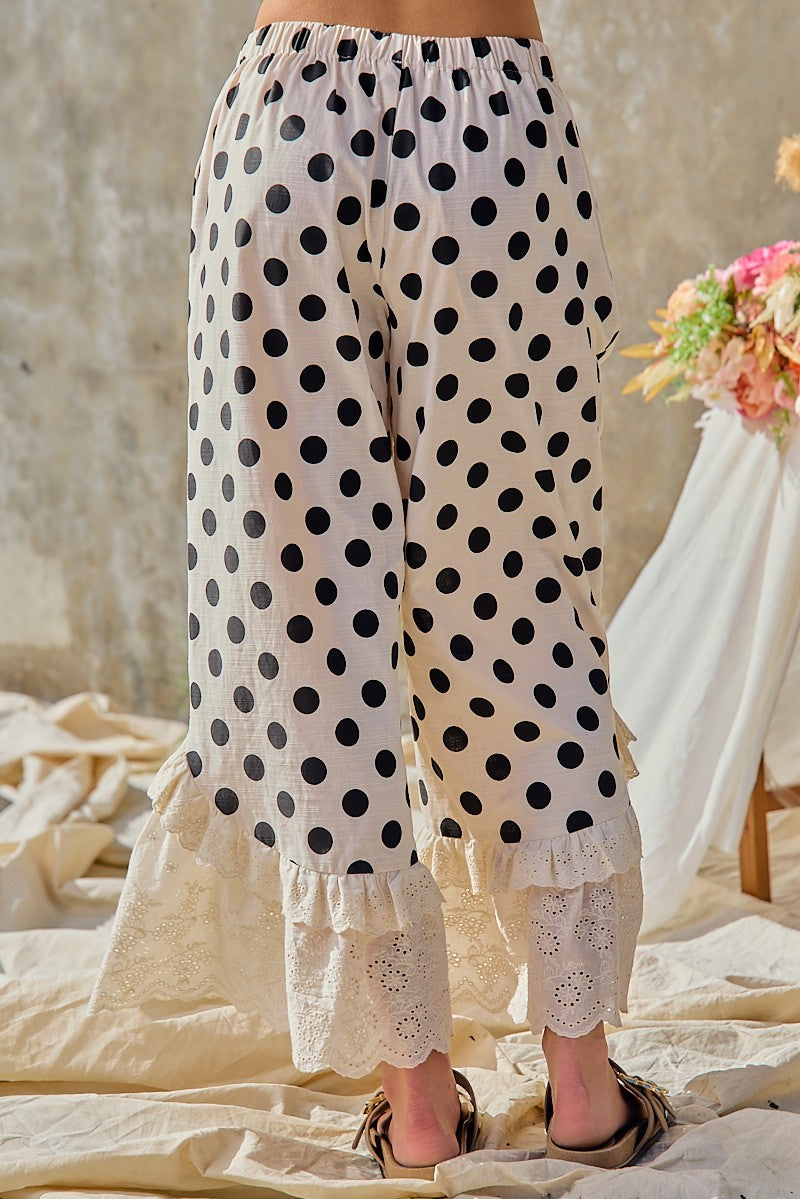 BiBi women's cream black polka dot wide leg pants with eyelet lace ruffle hem, back view
