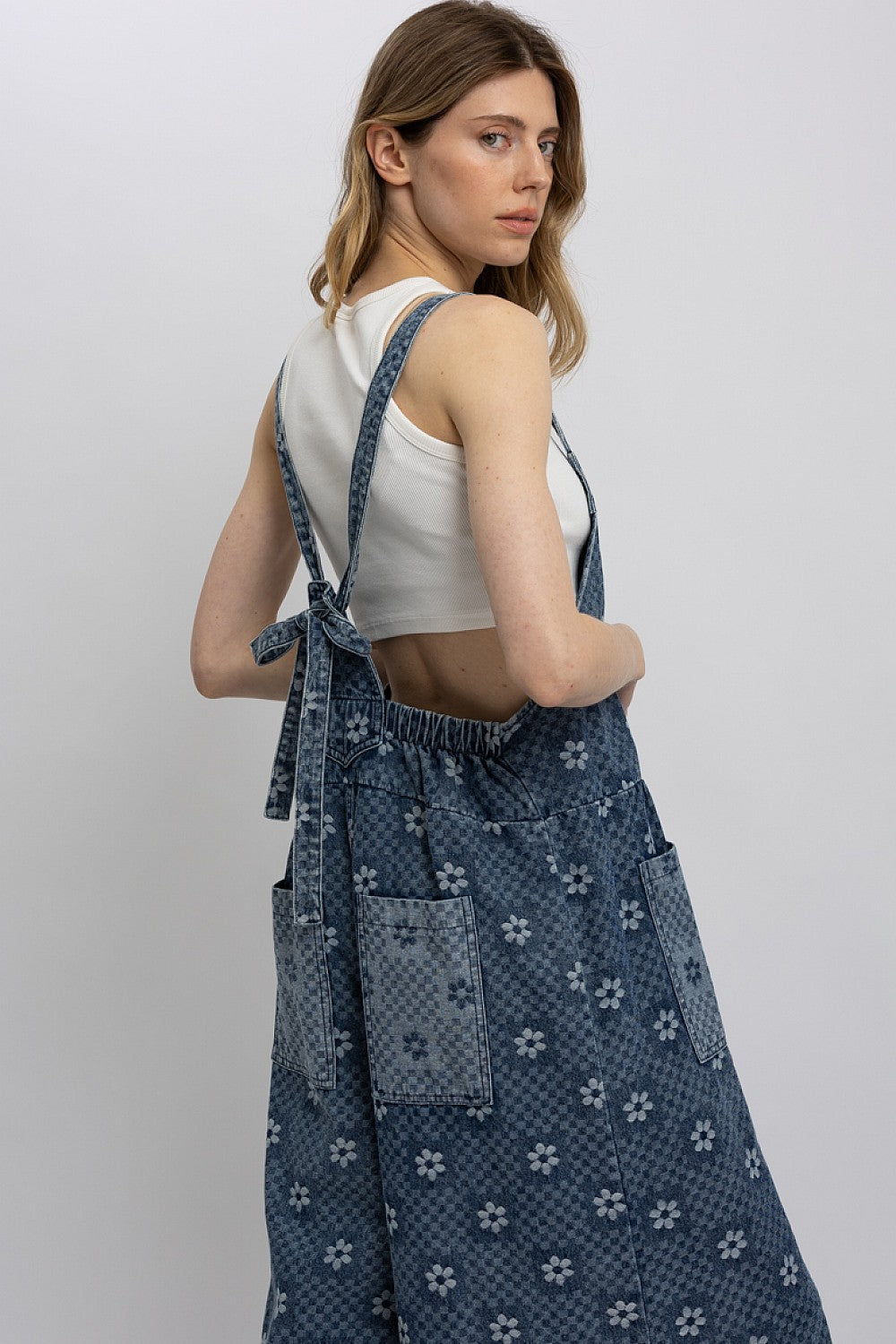 Blue Velvet Women's Blue Floral Chambray Denim Wide-Leg Jumpsuit displaying square back neckline and tie shoulder straps.