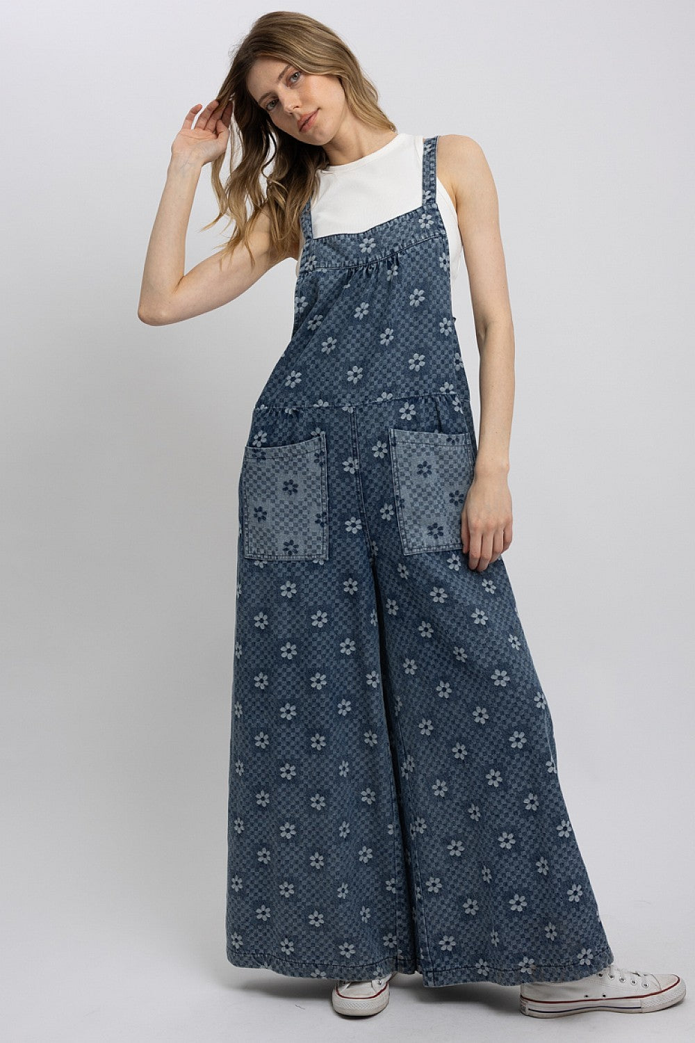 Blue Velvet Women's Blue Floral Chambray Denim Wide-Leg Jumpsuit with ditsy daisy checker print and front patch pockets.