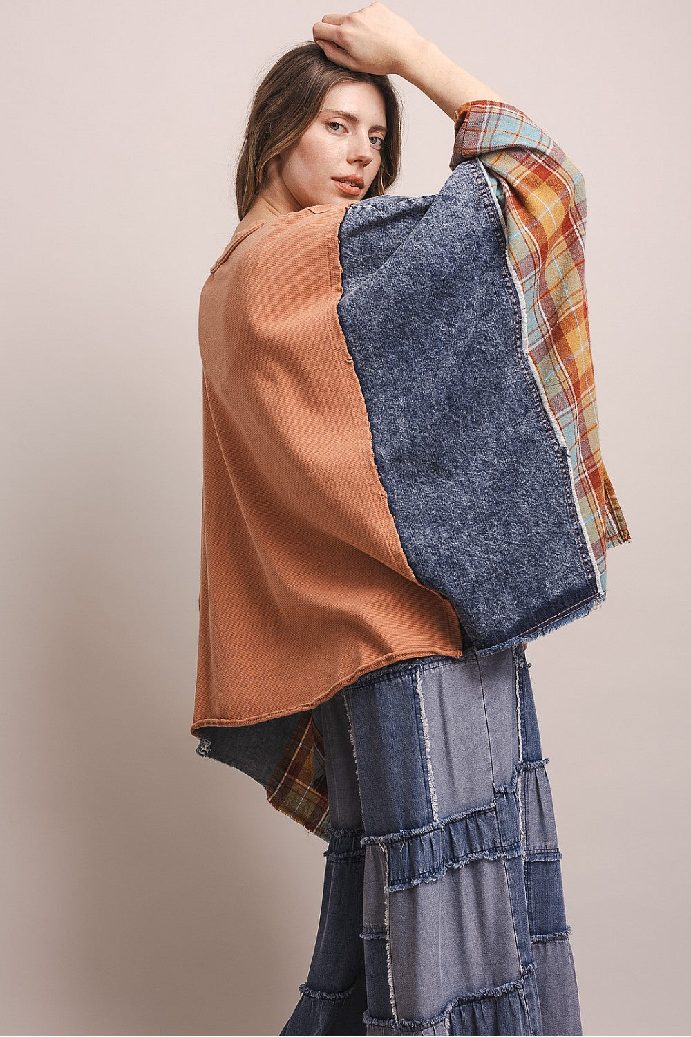 Bluevelvet coral LOVE patchwork poncho top, close-up front view showing appliqué lettering and contrast fabric panels
