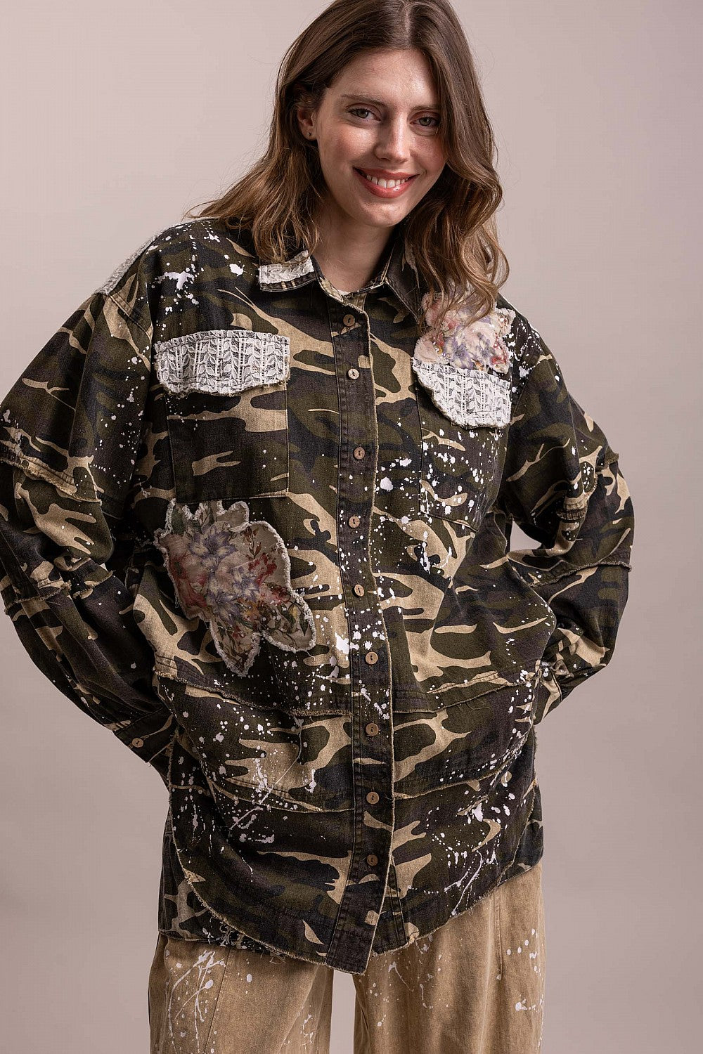 Blue Velvet camo jacket front with floral applique, lace chest details and cream paint-splatter design