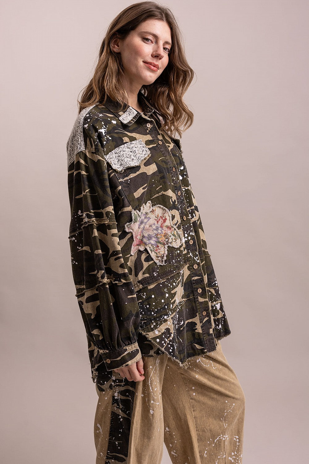 Blue Velvet camo floral patchwork jacket, side view showing long curved hem and button cuffs