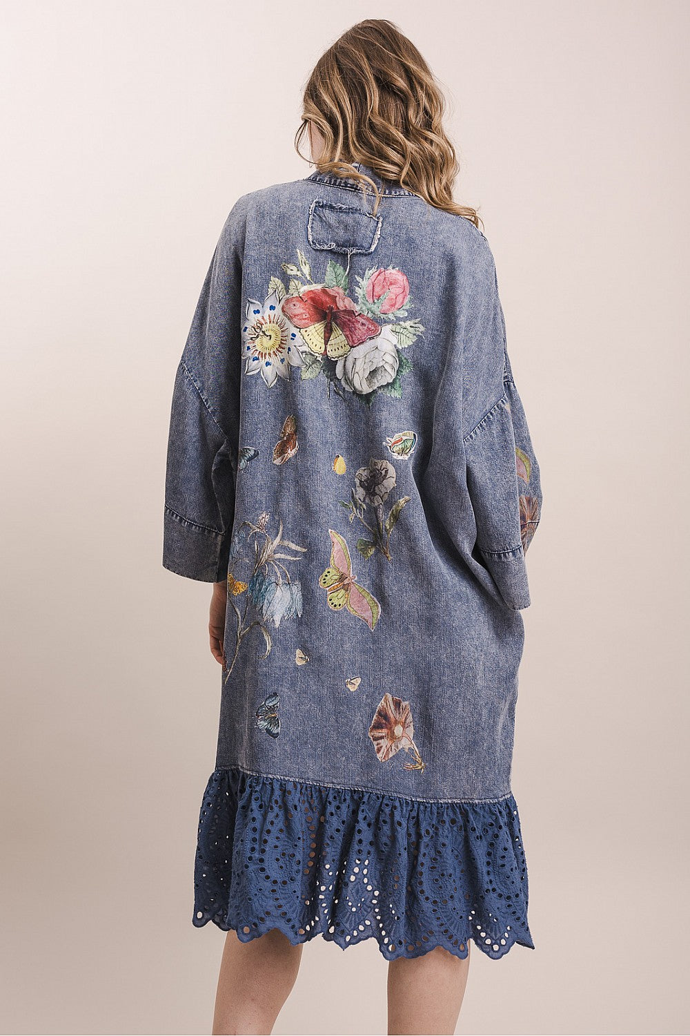 Blue Velvet women's blue kimono back view showing floral butterfly print and navy eyelet hem