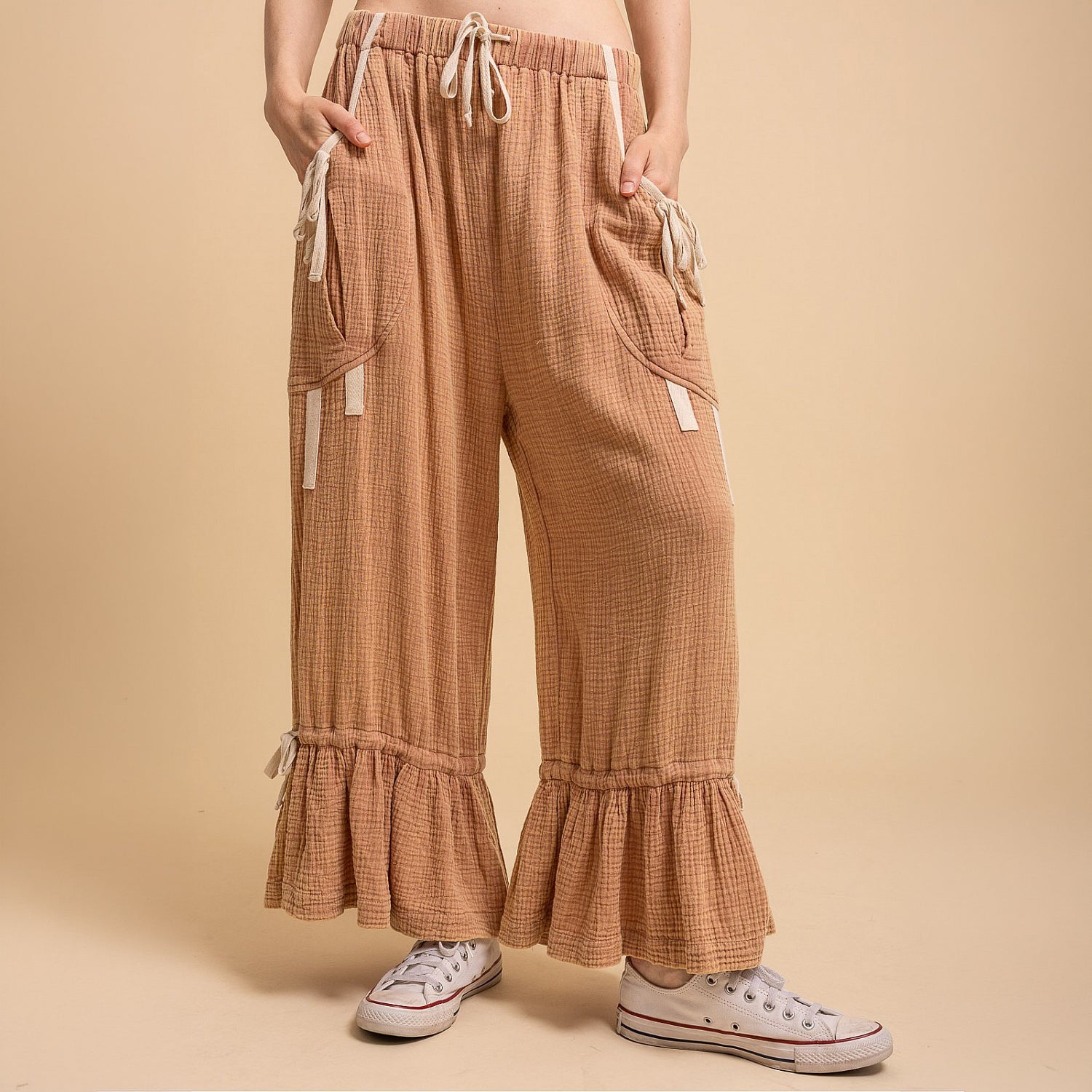 Bluevelvet women's sienna bloomer pants with bow tie waist, cargo pockets, and ruffle hem, front view
