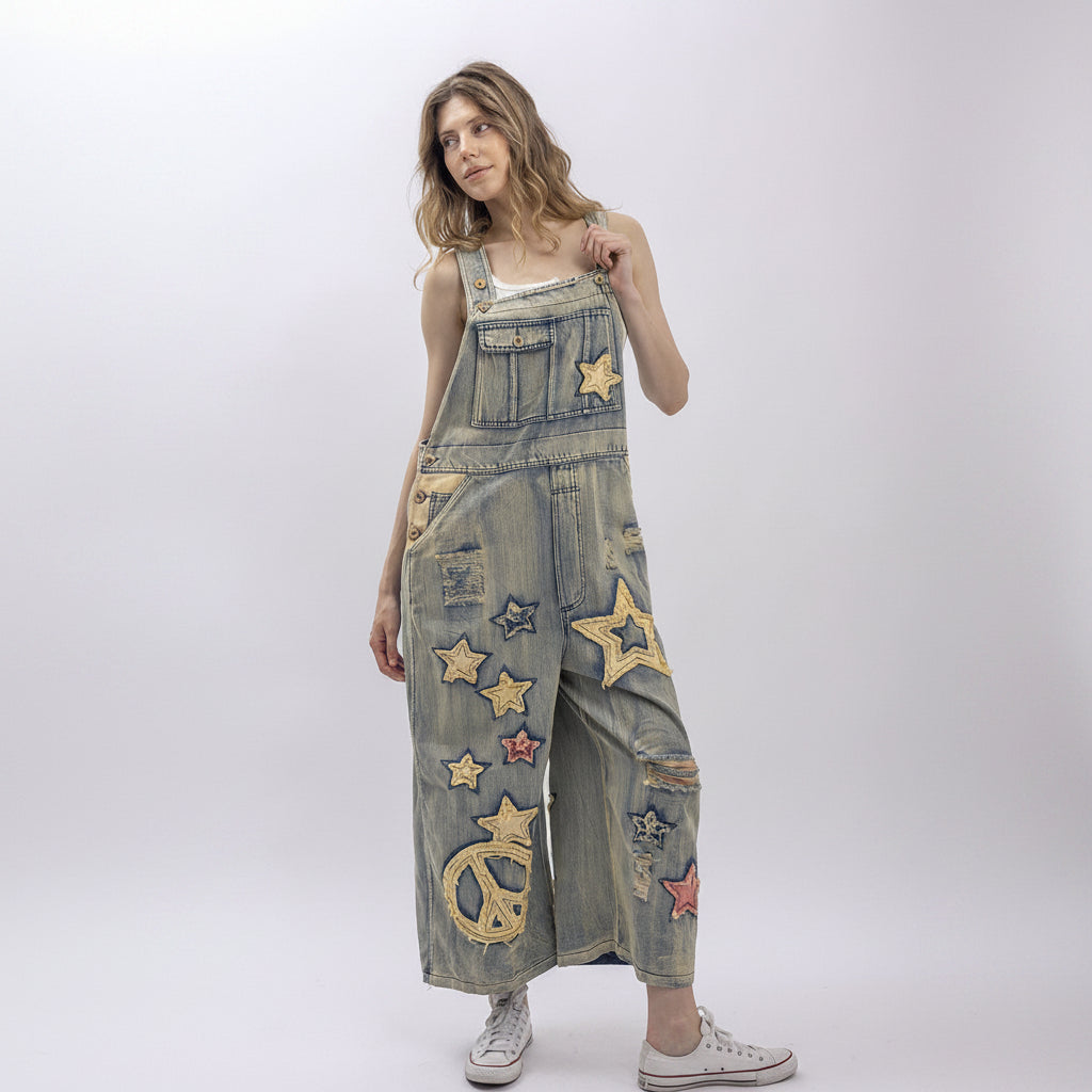 Bluevelvet women's vintage wash denim star patch overall jumpsuit, back view showing cross straps
