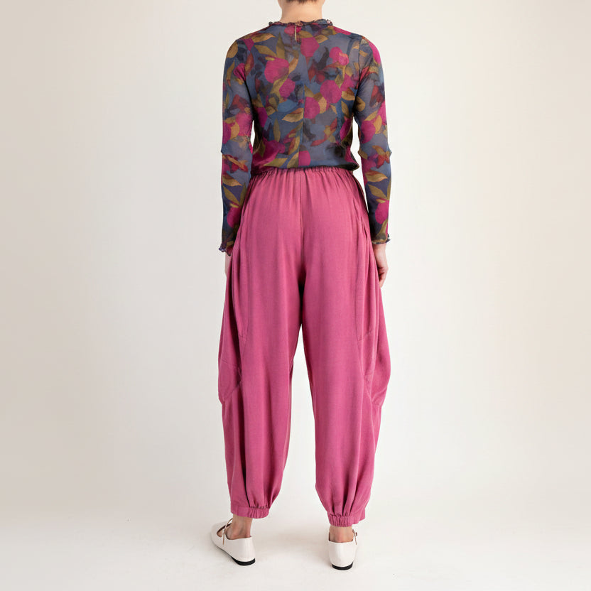 Easel women's rose pink harem pants back view showing elastic waistband, balloon leg, and cinched ankle cuffs
