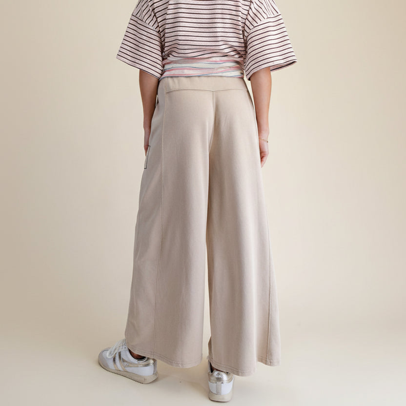 Easel khaki mineral wash wide-leg pants back view, relaxed wide-leg silhouette and defined seam detail
