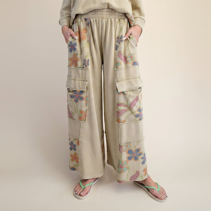 Easel dusty sage floral terry lounge pants, front leg close-up showing cargo pockets and floral print panels
