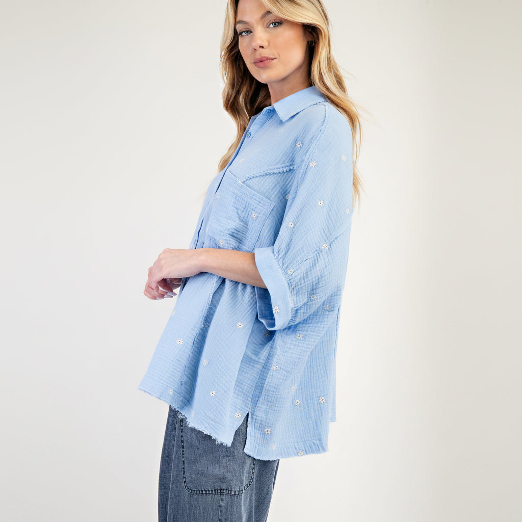 Easel women's sky blue cotton gauze shirt, side profile view showing raw-edge hem and relaxed drape
