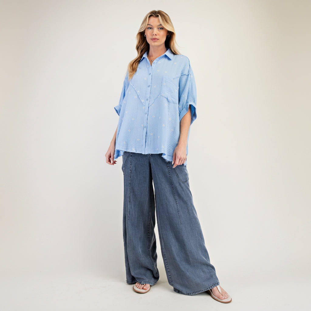 Easel women's sky blue embroidered gauze button-front shirt, full front view, boxy silhouette, wide-leg denim
