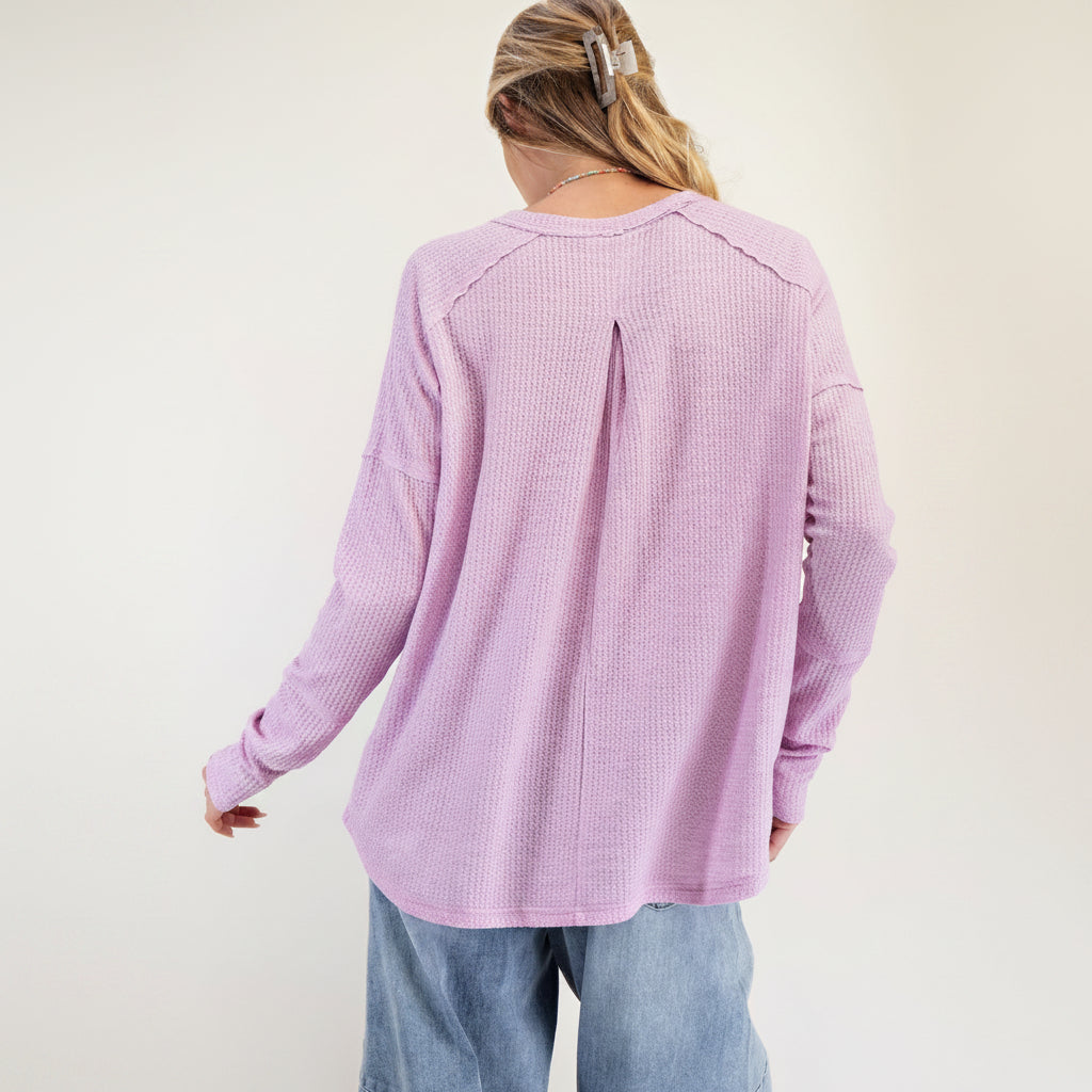 Easel lavender pink thermal knit pullover, back view showing center pleat and raglan seam construction
