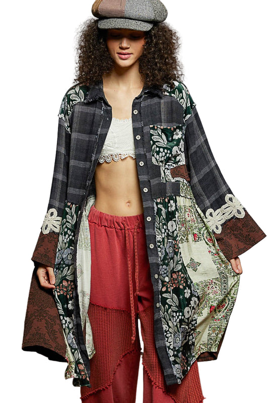 Person wearing a patterned coat over a red outfit with a white top, on a white background