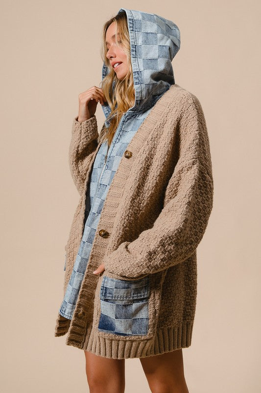 a woman wearing a jacket with a hood