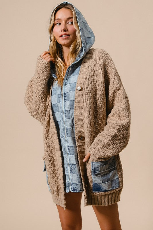 a woman is wearing a jacket and shorts