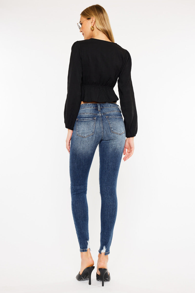 KanCan women's dark wash skinny jeans rear view showing back patch pockets, yoke stitching and faded seat