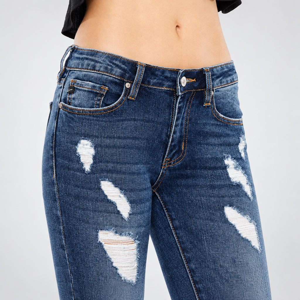 KanCan dark wash jeans waist close-up showing button, belt loops, coin pocket and shredded upper thighs