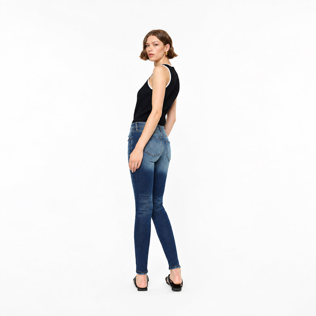 KanCan women's dark wash jeans front waist detail with button closure, coin pocket and whiskering