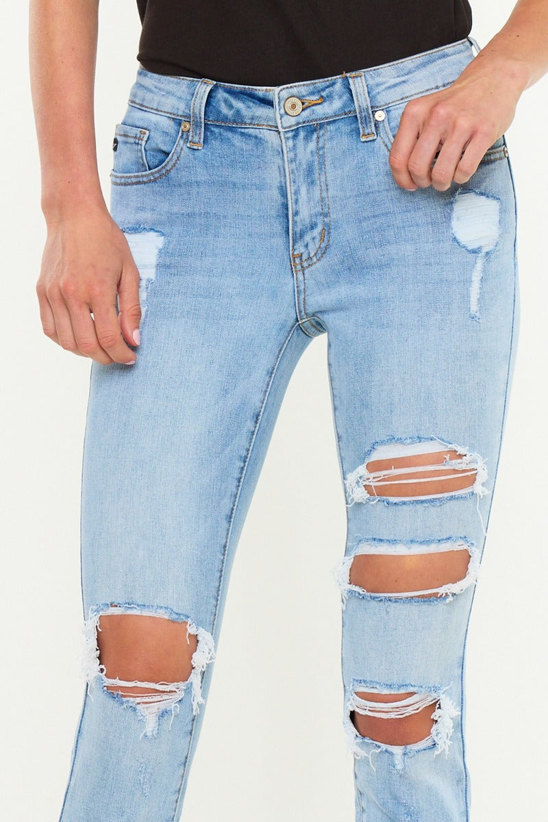 KanCan Skinny Augustina Jeans close-up of light wash denim whiskering and knee distressing - upper half