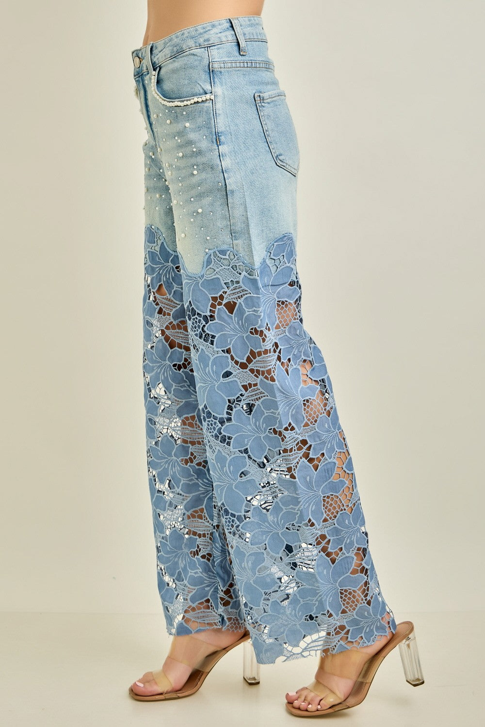 KIWI denim wide-leg jeans with floral crochet lace panels on model, full-length side view
