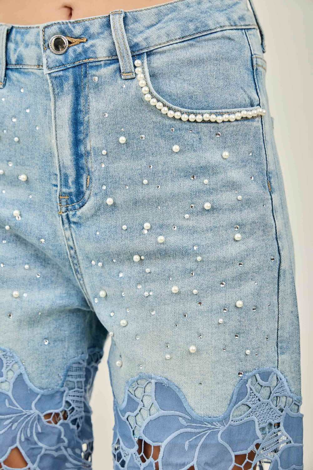 KIWI denim wide-leg jeans with pearl stud trim and lace panels on model, full-length back view
