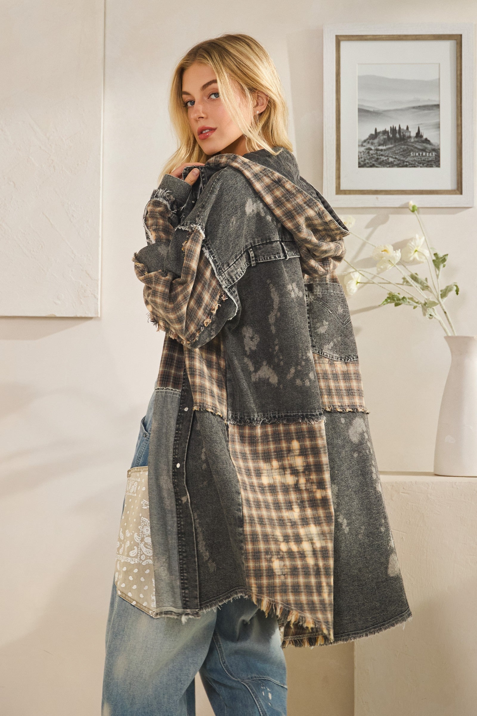 Oli & Hali black taupe patchwork shacket on model, side view showing bleach-splatter denim and plaid panels
