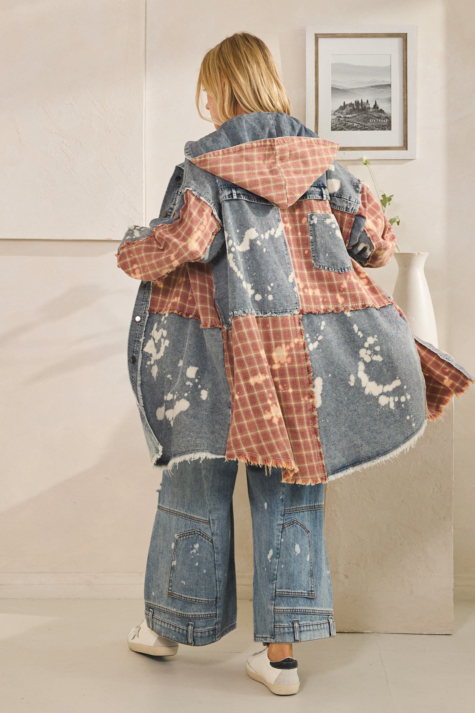 Oli & Hali denim marsala longline patchwork shacket on model, back view showing frayed seams and silhouette

