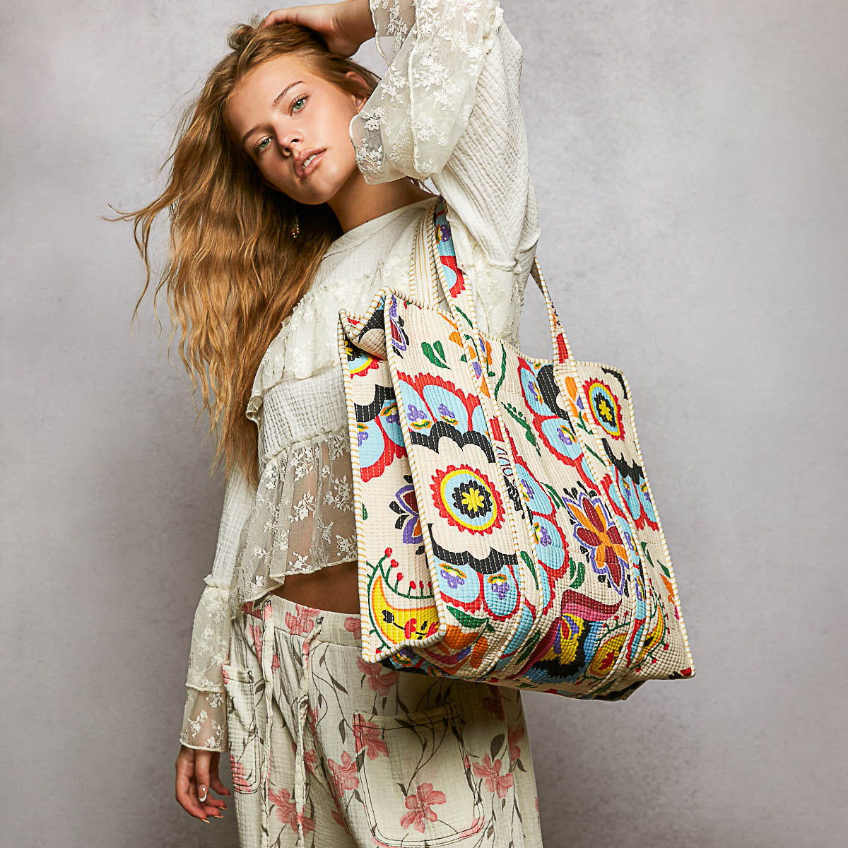 POL Clothing women's Cream Multi multicolor quilted tote carried front-facing