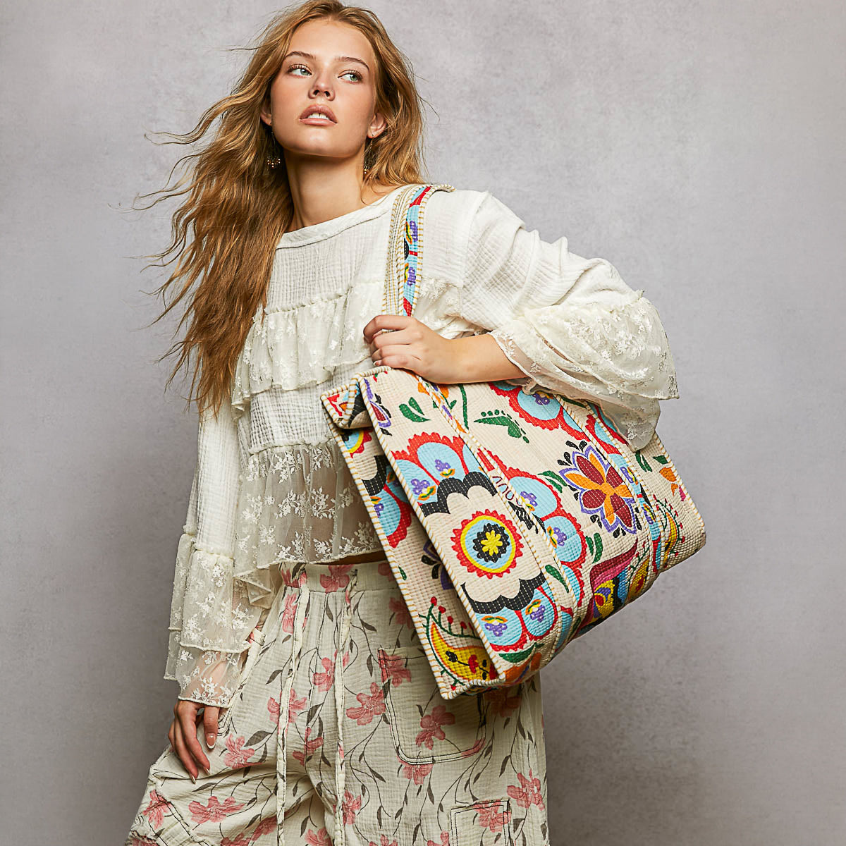 POL Clothing women's Cream Multi colorful quilted tote styled with a cream boho outfit