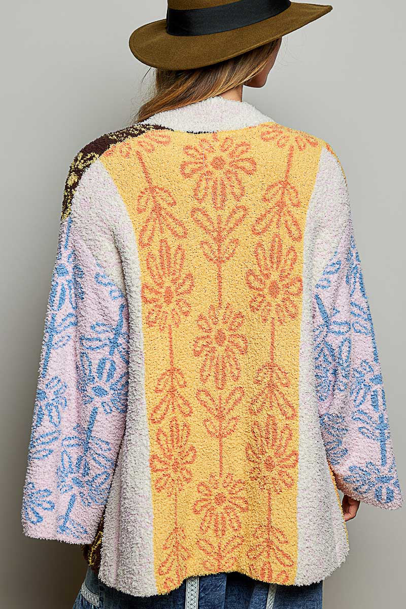 POL Powder Beige Multi floral jacquard cardigan on model, close-up front detail showing colorblock panels
