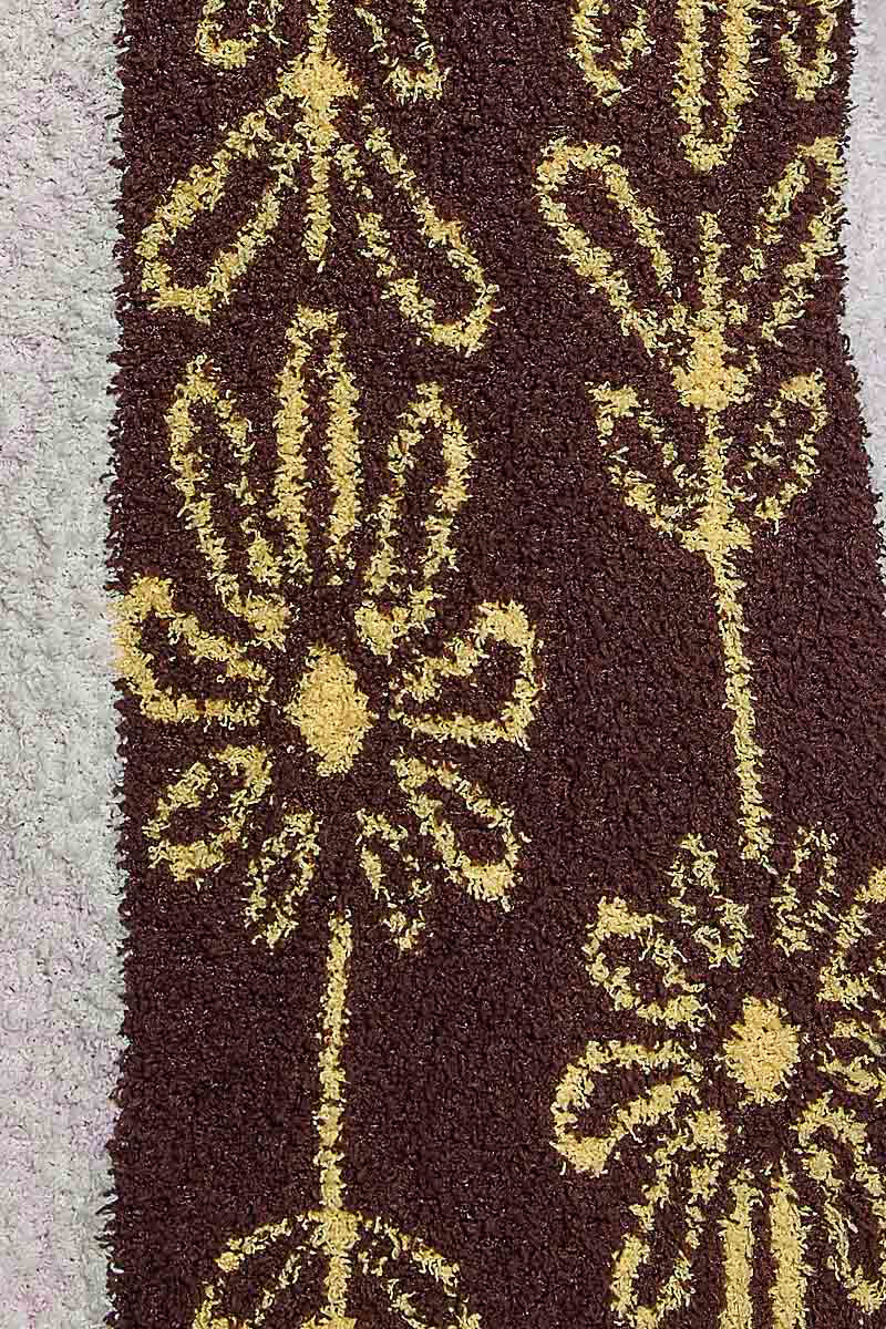 POL Powder Beige Multi open-front cardigan on model, three-quarter angle showing brown and pink floral panels
