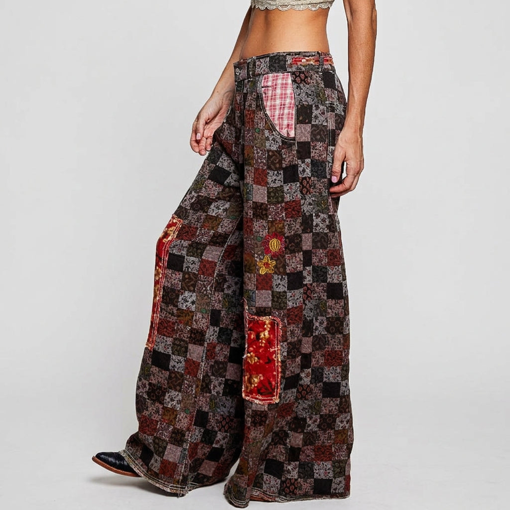 POL Clothing women's burgundy patchwork pants, three-quarter view showing plaid pockets and floral embroidery
